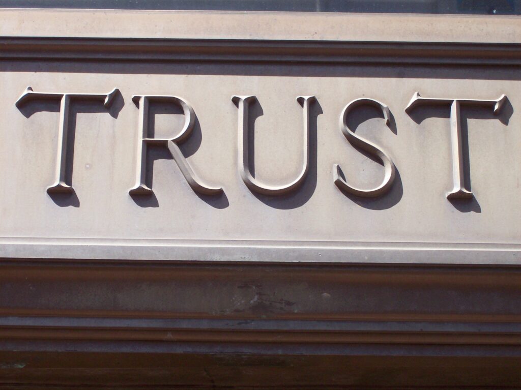 building facade, the word trust